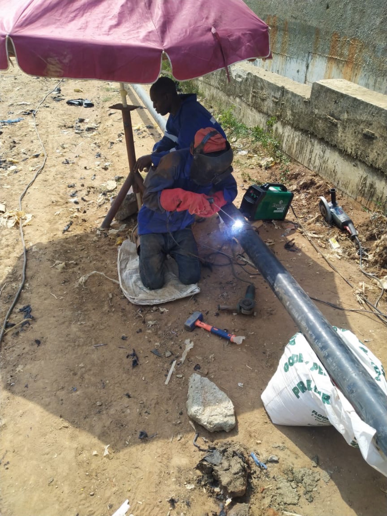 Welding under umbrella